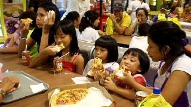 'Enjoying pizza dinner at SM Food Court July 11, 2009'