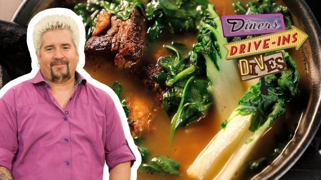 'Guy Fieri Slurps on Temporo Shoyu Ramen | Diners, Drive-Ins and Dives | Food Network'