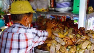 'Popular for 42 Years! Famous Braised Pork & Organs In Orussey Market | Cambodian Street Food'