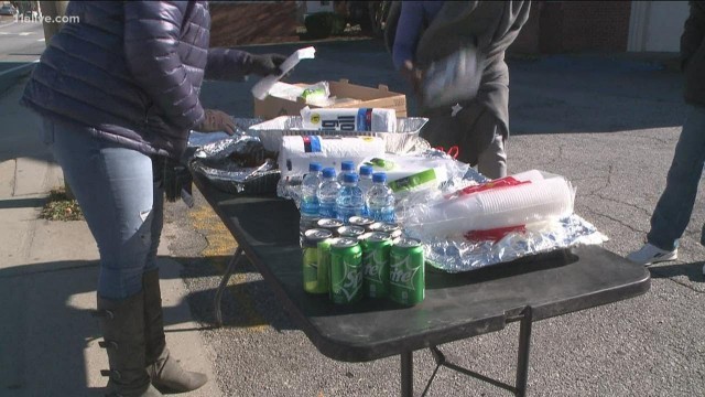 'Volunteers serve food to those in need at St Mark Baptist Church in Atlanta'