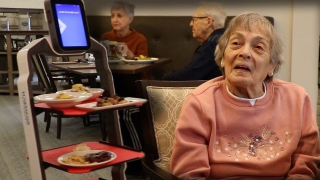 'Robots serve food to seniors at this retirement community'