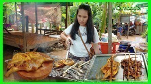 'Cambodia street food in Siem Reap - Breakfast at front of Angkor Wat - Awesome Grilled chicken.'