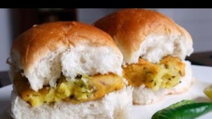 'Foreigners trying Indian street food - Vada Pav'