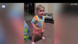 'Adorable Florida Toddler argue with parents after they caught her stealing dogs food'