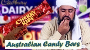 'Tribal People Try Australian Chocolate Bars For The First Time'