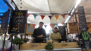 'Indian Street Food: Aloo Tikki Chaat with Chickpea Curry (Chana Masala) Camden Lock Market, London.'