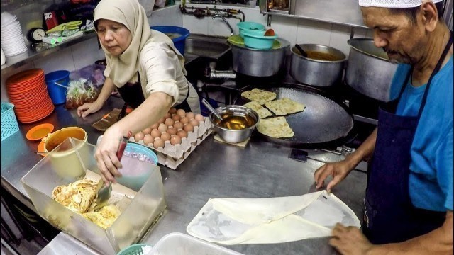 'Great Skill Cooking Indian Prata and Murtabak. Tekka Hawker Centre. Singapore Street Food'