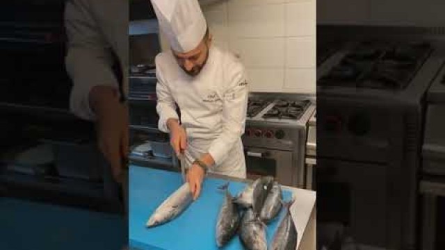 'Under the guidance of Chef Mehmat, the Fish Food Preparation Process'