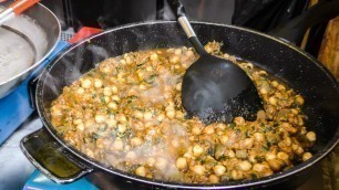 'Food from Indonesia Tasted in London Camden Town. Chicken and Beef Rendang. Street Food'