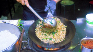 'Chinese Street Food -Fried rice with chives and eggs, fire-exploded chicken drumsticks'