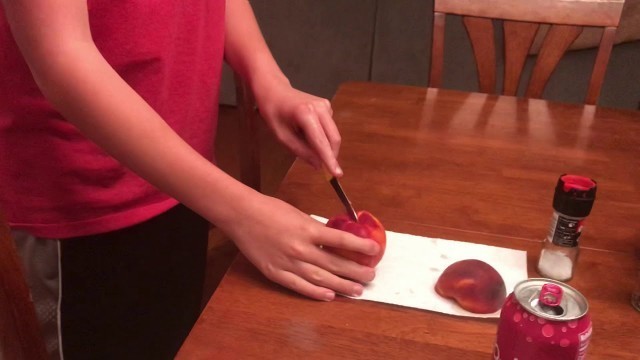 'Legit Food Review: Buff Young Man Slices Open Juicy Peach'